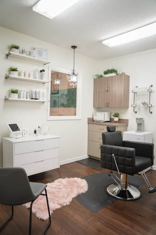 Hair and makeup salon studio room with a chair